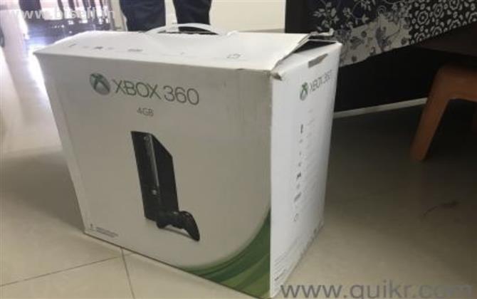 XBOX 360 E With 6 games for sale.